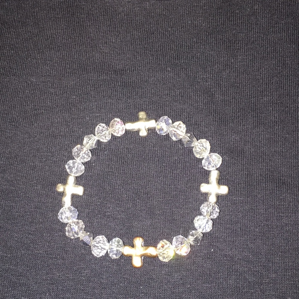 Clear beads and silver cross bracelet